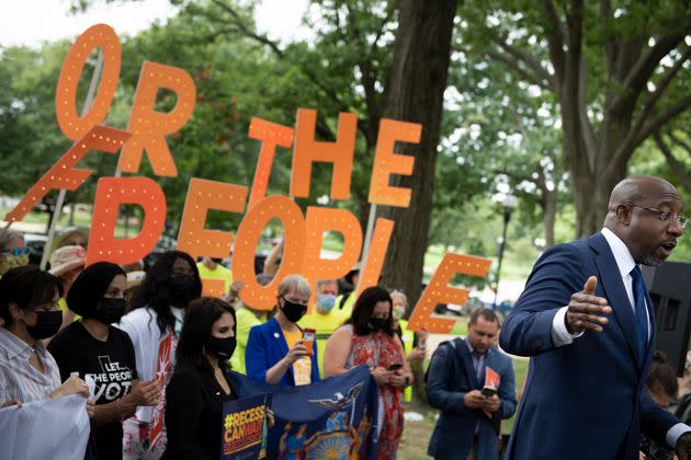 U.S. Sen. Raphael Warnock (D-Ga.) speaks to people rallying for voters' rights on Capitol Hill on Aug. 3, 2021. (Photo: BRENDAN SMIALOWSKI via Getty Images)