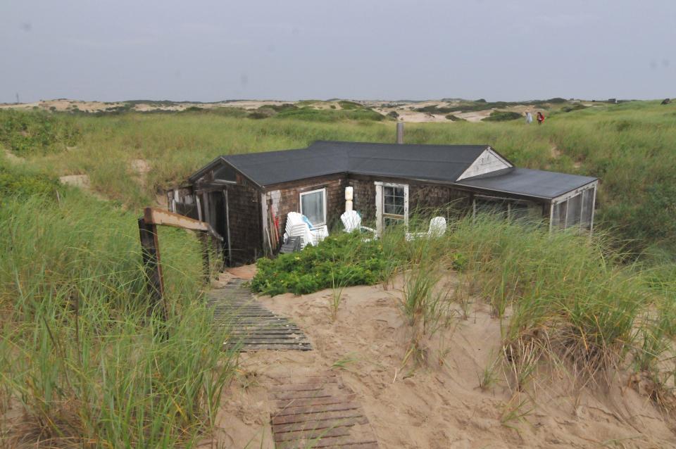 "Frenchie's Shack" sits low among the dunes surrounded by beach grass and rosa rugosa. A sit-in at a dune shack used by Salvatore Del Deo for decades was held June 27 to protest his eviction from "Frenchie's Shack".