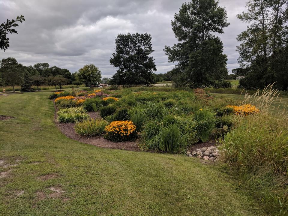 A large bioretention basin filters stormwater pollution from facilities and parking lot at the Sisters of St. Francis of the Holy Cross, Green Bay.