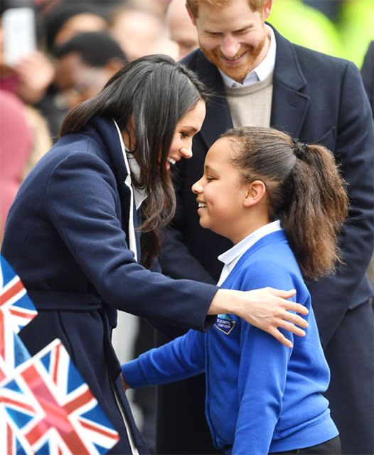 Meghan speaks to the schoolgirl during a visit to Birmingham in March. (Getty)