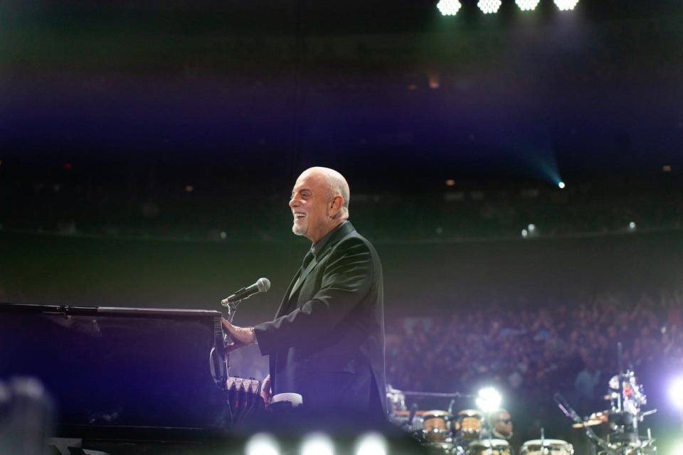 Billy Joel performing at his 100th Madison Square Garden residency show.