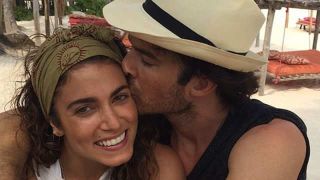 Nikki Reed and Ian Somerhalder are in newlywed heaven! The couple said "I do" on April 26, and now, they're traveling the world and soaking in the sun. The pretty pair started their honeymoon in Mexico, with Reed posting this adorable pic on Saturday and writing, "Salty…sandy…sticky…sunburned. The best. I love this human. My human." But a little sunburn certainly didn't deter the Vampire Diaries star and his wife from traveling to Brazil following their time South of the border! <strong> WATCH: Nikki Reed and Ian Somerhalder Are Married </strong> And both Reed, 26, and Somerhalder, 36, made us feel like we were right there with them. It's no wonder the <em>Twilight </em>actress loves this view. Later, Reed wrote a heartfelt message about her fondness for the country, along with a video of the newlyweds being welcomed by screaming fans. "Dear Brasil, you are stunning. You are stunning. Your country and the people who call it home. Thank you for having us." <strong> WATCH: Flashback: That Time Ian Somerhalder Kissed James Van Der Beek </strong> Somerhalder posted a pic as well, calling the couple's trip to Brazil "so beautiful." Talk about an amazing vacation for these love birds! Before he married Nikki, check out the video below to see how Ian puckered up for one lucky fan!