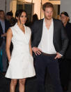 The pair traveled to New Zealand during their autumn tour abroad, where Markle wore a white double-breasted dress, similar to the one from baby Archie's debut. (Photo: Getty Images)