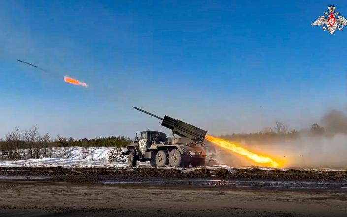 A video released by Russian Defense Ministry Press Service on Wednesday, Feb. 22, 2023, shows the Russian military's Grad multiple rocket launcher firing rockets at Ukrainian troops at an undisclosed location. - Russian Defense Ministry Press Service