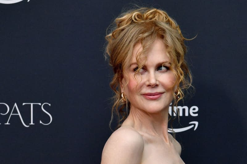 Australian-American actress Nicole Kidman poses for photographs as she arrives on the red carpet for a screening of the Prime Video series Expats at Palace Verona Cinema in Sydney. Bianca De Marchi/AAP/dpa