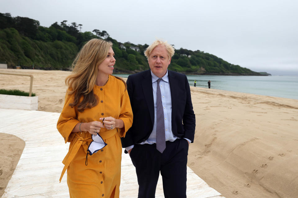 Prime Minister Boris Johnson and his wife Carrie Symonds in Cornwall ahead of the G7 summit in 2021. - Credit: Courtesy of Andrew Parsons / No10 Downing Street