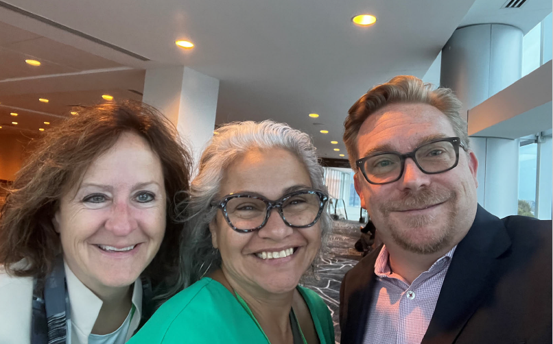 In this photo obtained from the Department of Education via records request, Commissioner Lizzette Reynolds poses with Danielle Mezera and Quentin Suffren, both ExcelinEd advisors on college and career pathways at an ExcelinEd summit in Indianapolis in October 2023.