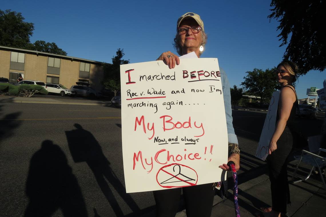 Gayle Wilde, 70, called for safe access to abortions for women 50 years ago. She joined the Tri-Cities Women’s March protest Friday evening.