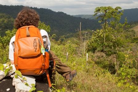 Enzo Monfre sitting above the Rios Tropicales Reforestation Project - Costa Rica - photo: Heidi Acott