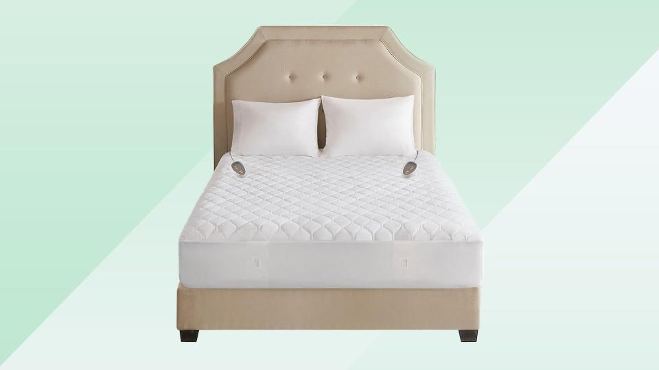 Pair this mattress pad with an electric heated blanket and you'll be unstoppable this winter. (Amazon)