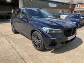 A BMW X5 plug-in hybrid is pictured while undergoing tests by Emissions Analytics for a study on emissions by NGO Transport & Environment