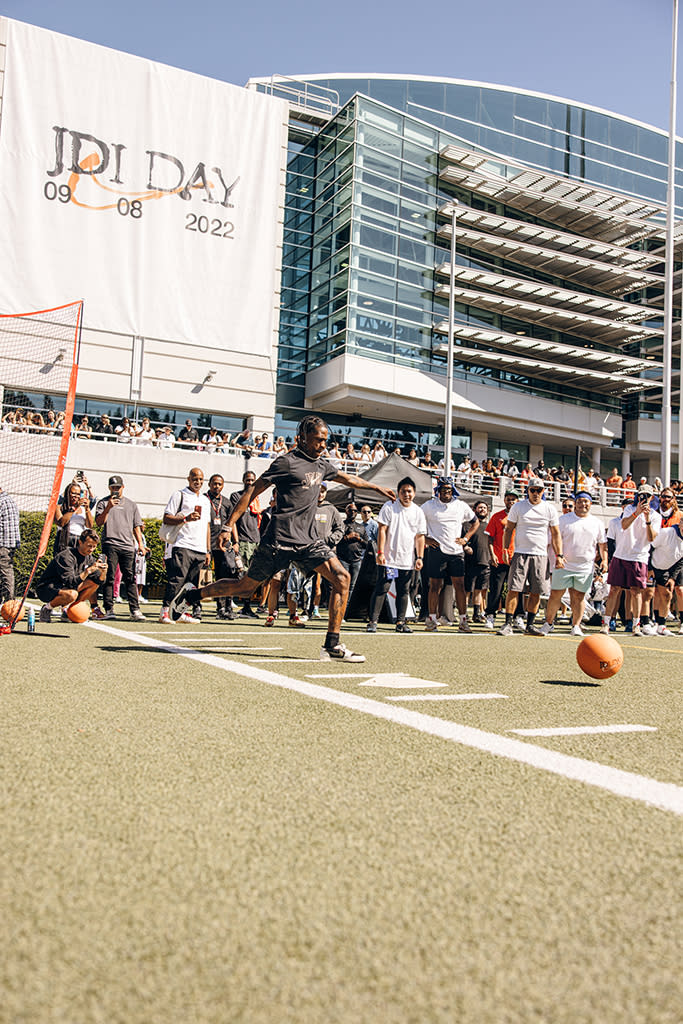 Travis Scott playing kickball at JDI Day. - Credit: Courtesy of Nike