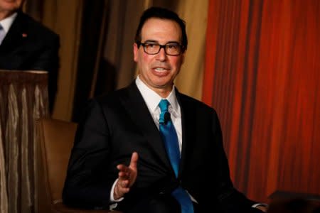 FILE PHOTO: U.S. Treasury Secretary Steven Mnuchin speaks during a moderated discussion before the Economic Club of New York, in New York City, U.S., November 9, 2017. REUTERS/Brendan McDermid