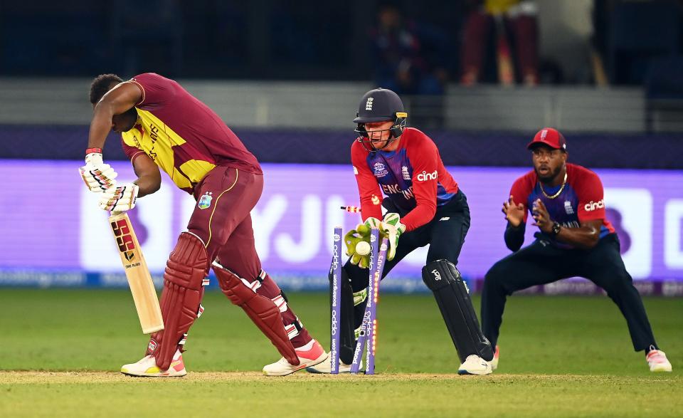 Andre Russell is bowled by Adil Rashid (Getty Images)