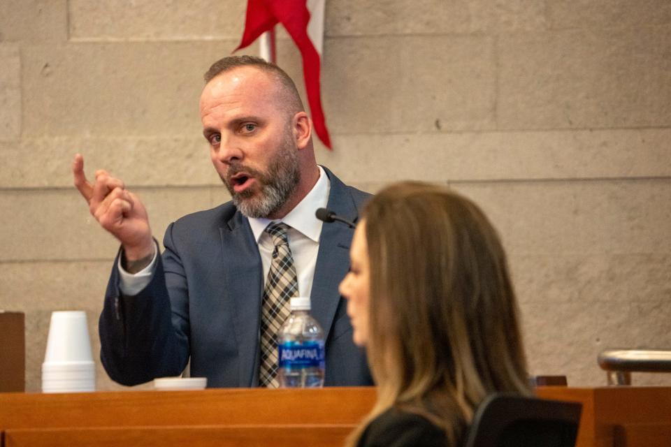 Former Franklin County Sheriff's deputy Jason Meade demonstrated on the stand Tuesday, Feb. 6, 2024, how he alleges Casey Goodson Jr. moved around a fence to enter Goodson's home.