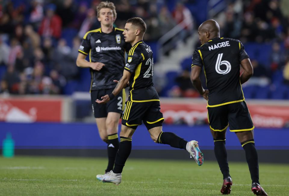 Mar 18, 2023; Harrison, New Jersey, USA; Columbus Crew midfielder Alexandru Matan (20) celebrates after scoring a opening goal against New York Red Bulls at Red Bull Arena. Mandatory Credit: Vincent Carchietta-USA TODAY Sports