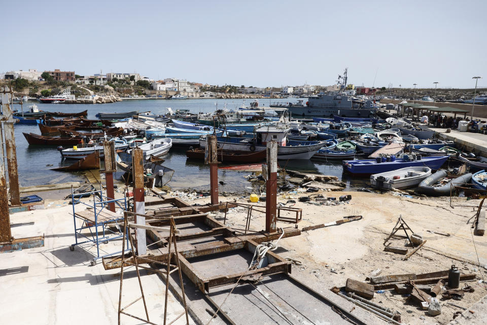 Boats which were used to carry migrants are accumulated in the port of the Sicilian island of Lampedusa, southern Italy, Monday, Sept. 18, 2023. The Italian Cabinet met Monday to adopt new measures to crack down on migration after the southern island of Lampedusa was again overwhelmed by a wave of arrivals from Tunisia and the migration issue again took center stage in Europe with talk of a naval blockade. (Cecilia Fabiano/LaPresse via AP)