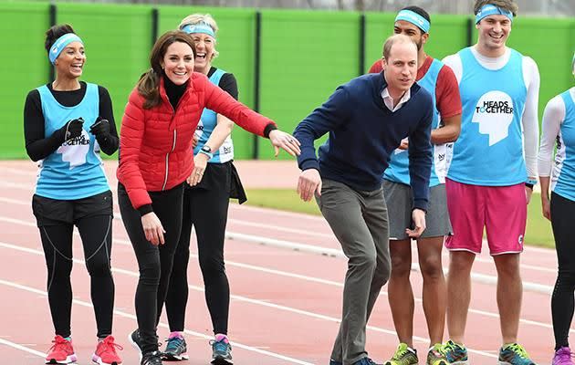 Before the race, the royals playfully wrestled with each other. Photo: Getty