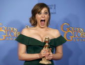 Rachel Bloom poses with her award for Best Performance by an Actress in a Television Series - Musical or Comedy for her role in "Crazy Ex-Girlfriend" backstage at the 73rd Golden Globe Awards in Beverly Hills, California January 10, 2016. REUTERS/Lucy Nicholson