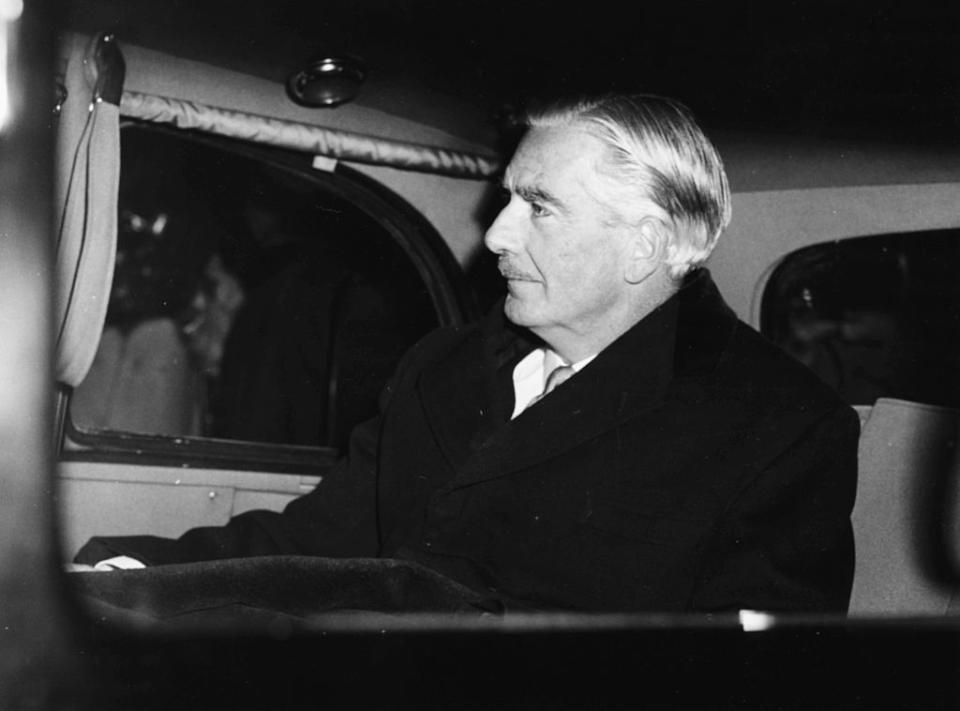 British Prime Minister Sir Anthony Eden in the back of a car, leaving his office at 10 Downing Street for Buckingham Palace, London, January 9th 1957. | John Franks—Keystone/Getty Images