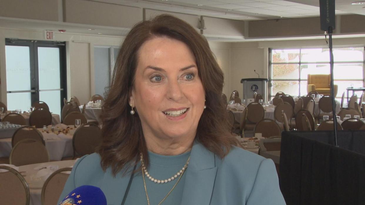 Finance minister Siobhan Coady was warmly received at Friday's post-budget luncheon at Bally Haly Country Club, where she gave highlights from the budget.  (Darryl Murphy/CBC - image credit)