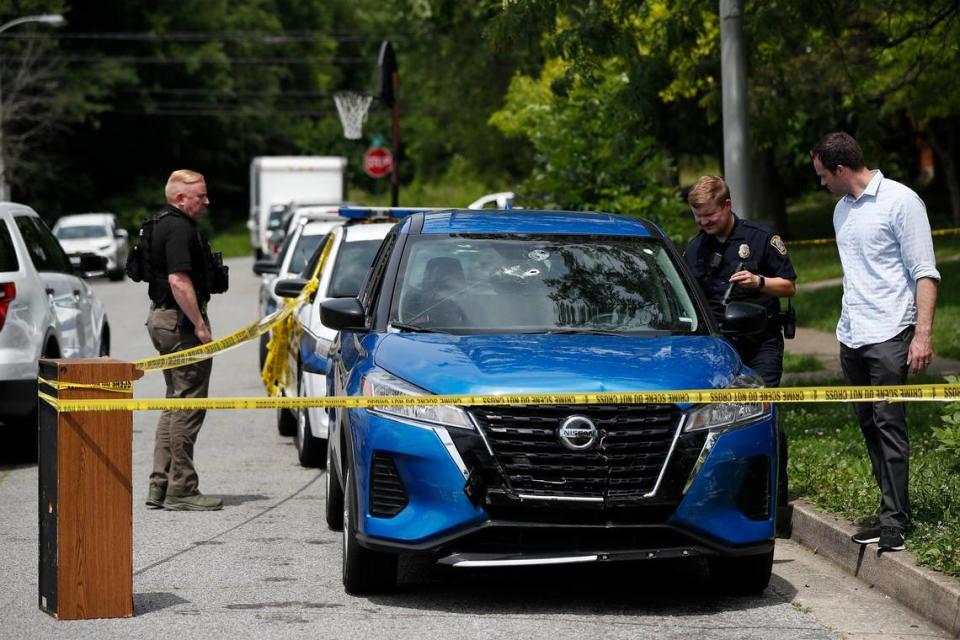 Lexington police examined a vehicle on Gatehouse Place, where Antonio “Tony” Cotton was last seen. FBI agents trying to arrest Cotton fired on him after their car was rammed, the FBI said.