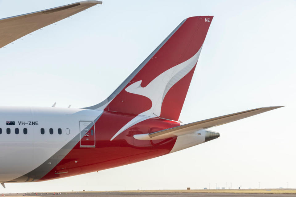 An image of a Qantas plane's tail.