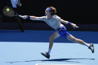 Andrey Rublev plays a forehand return during a practice session ahead of the Australian Open tennis championships at Melbourne Park, Melbourne, Australia, Friday, Jan. 12, 2024. (AP Photo/Andy Wong)