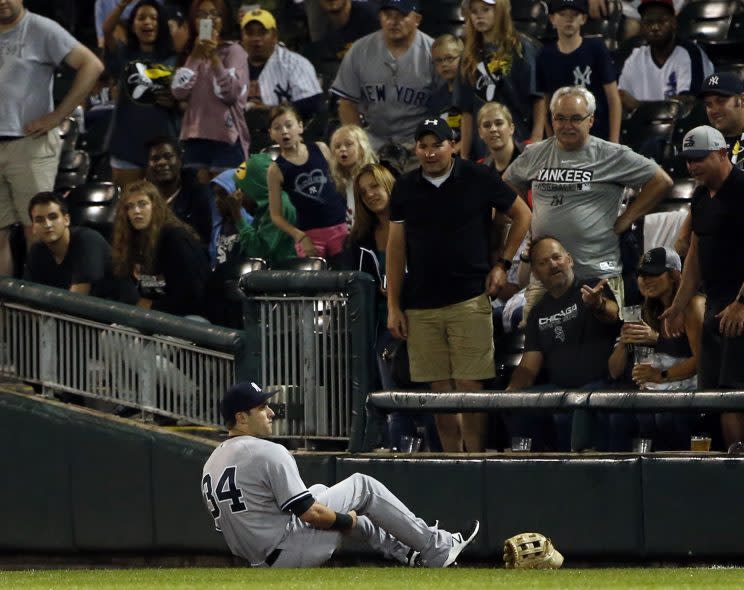 Dustin Fowler was carted off the field in his major-league debut. (AP Photo)