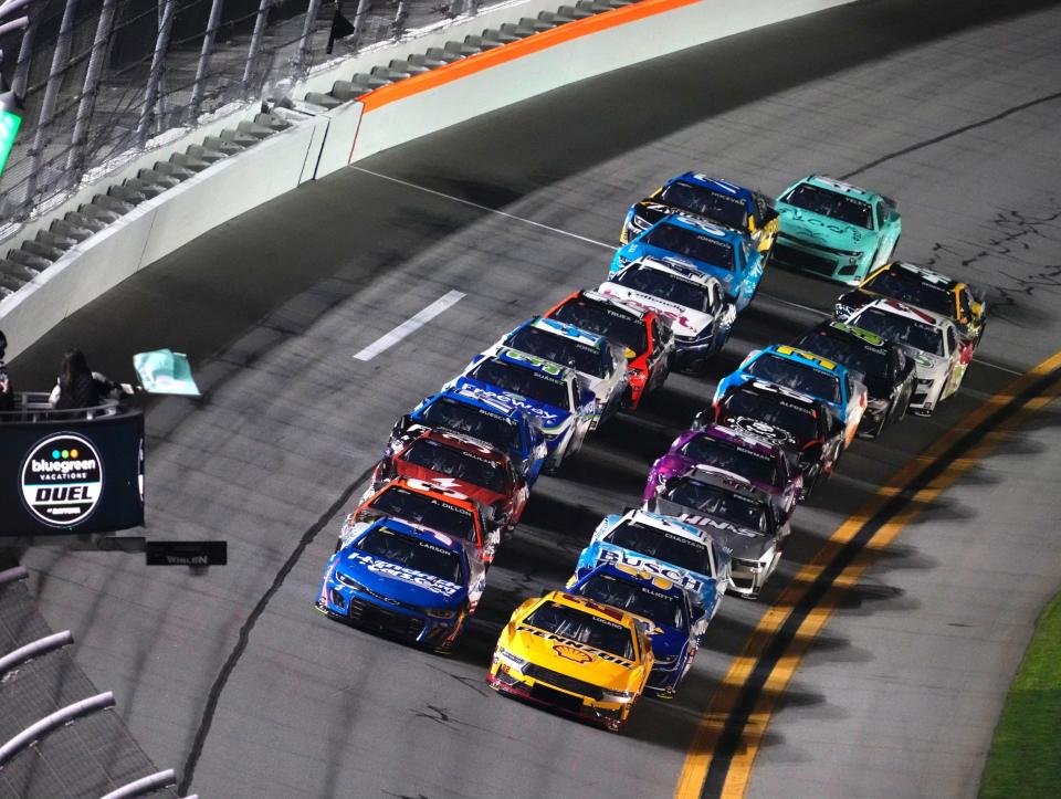 Joey Logano (22, right) and Kyle Larson (5) lead the field to the green flag in the first of two BlueGreen Vacation Duel at Daytona races on Thursday, February 15, 2024.