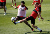 Football Soccer - Atletico Madrid training - Majadahonda, Spain -21/5/16- Atletico Madrid's Thomas Partey (L) and Antoine Griezmann attend a training session in Majadahonda. REUTERS/Juan Medina