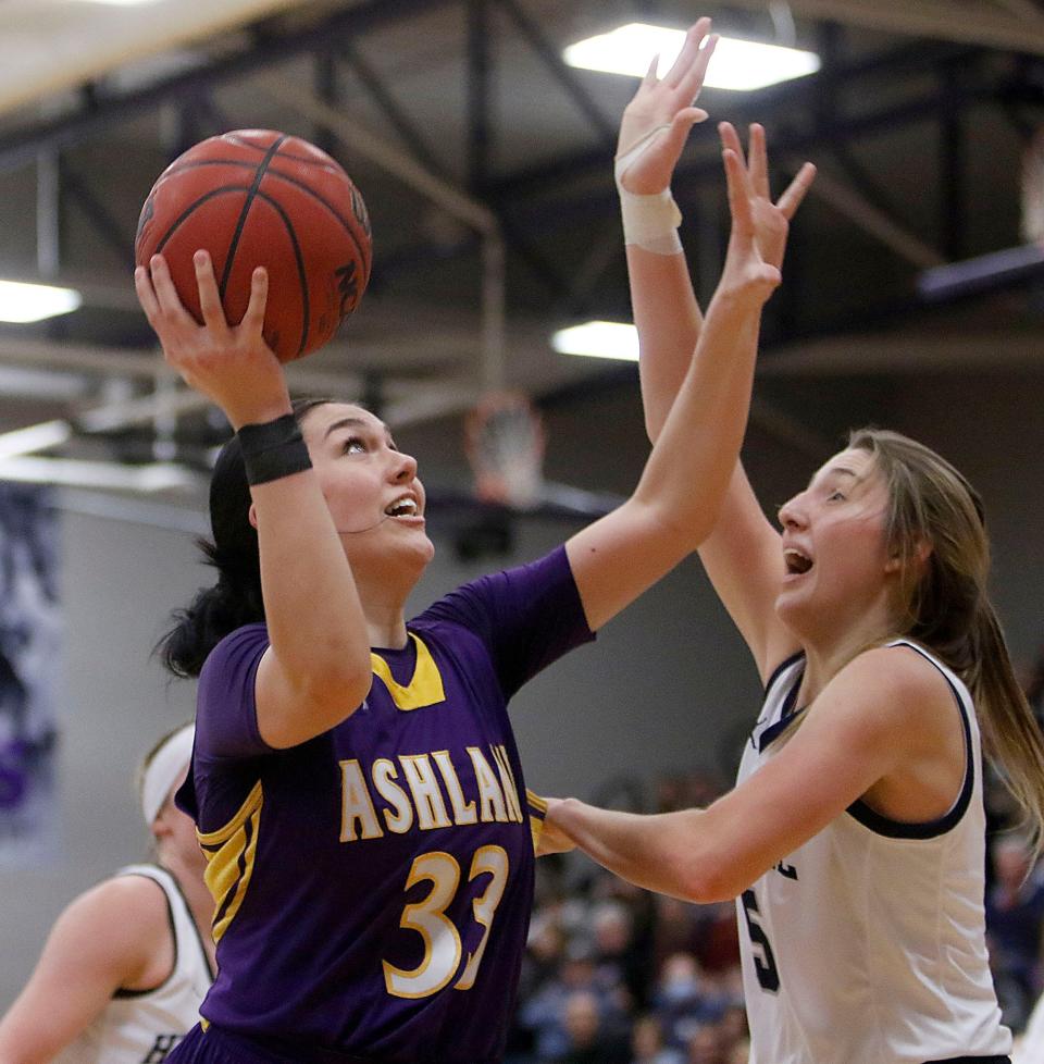 Ashland University's Hayley Smith (33) shoots as Hillsdale College's Sydney Mills defends during their NCAA college women's basketball game Saturday, Feb. 26, 2022 at Kates Gymnasium. TOM E. PUSKAR/TIMES-GAZETTE.COM