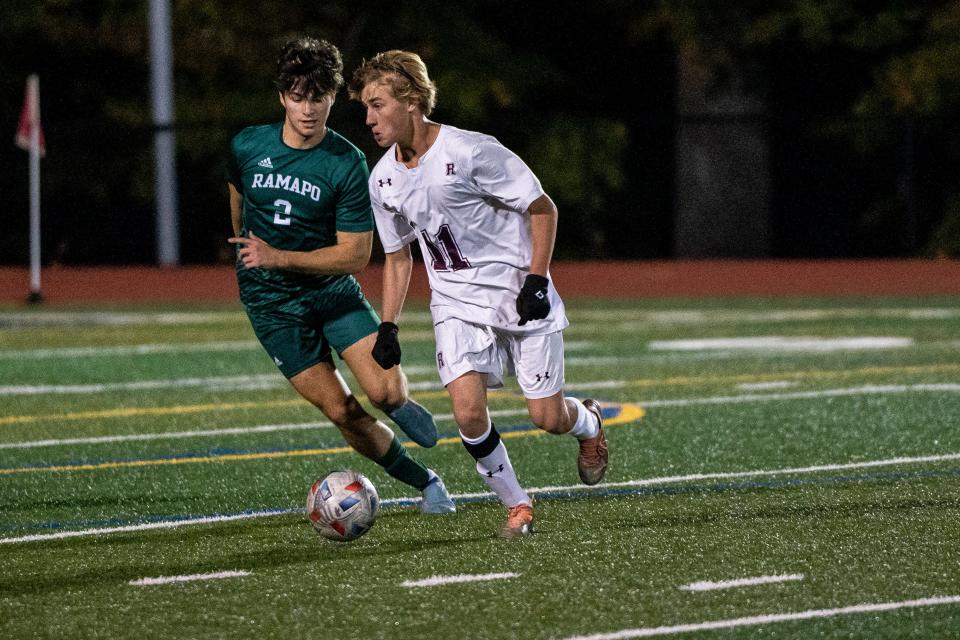 Ramapo plays Ridgewood in the Bergen County boys soccer championship at Indian Hills High School in Oakland, NJ on Saturday October 22, 2022. (From left) Ramapo #2 Jacob Marcos and Ridgewood #11 Cameron Linnington. 