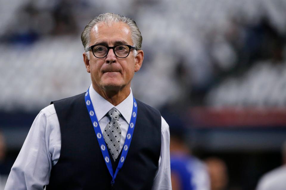 Mike Pereira walks across the field before a game in September 2019.