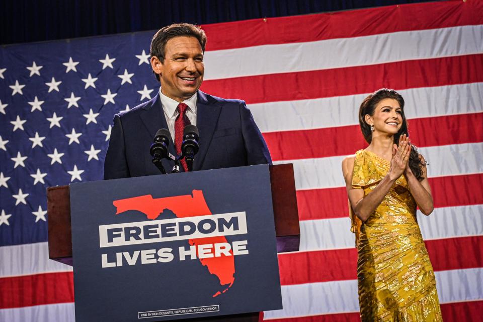 Republican Florida gubernatorial candidate Ron DeSantis with his wife, Casey DeSantis, speaks to supporters during an election night watch party in Tampa, on Nov. 8, 2022. 