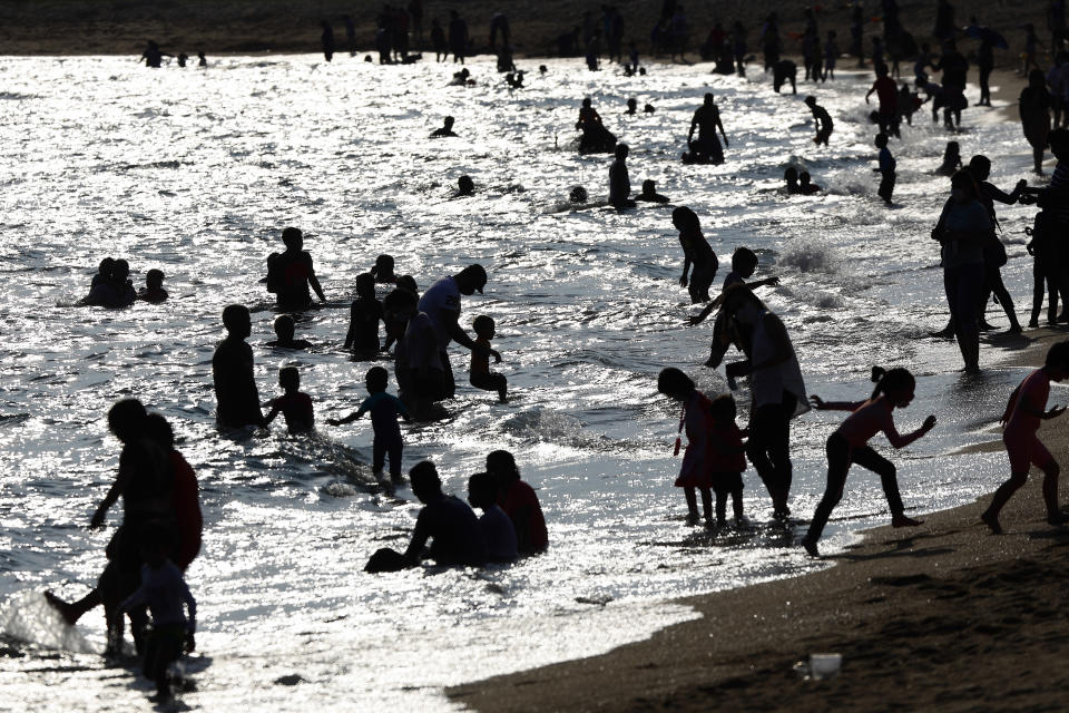 People relaxing at a beach at East Coast Park in Singapore.