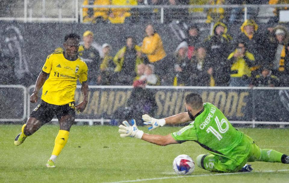 Dec 9, 2023; Columbus, OH, USA; Columbus Crew midfielder Yaw Yeboah (14) scores a goal against Los Angeles FC goalkeeper Maxime Crepeau (16) to give the Crew a 2-0 in the first half of 2023 MLS CUP at Lower.com Field. Mandatory Credit: Kyle Robertson-USA TODAY Sports