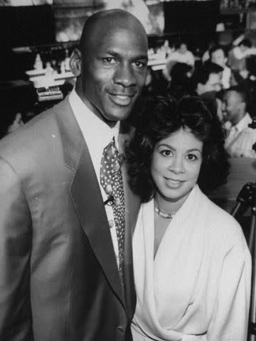 <p>Steve Kagan/Getty</p> Michael Jordan and his wife Juanita at the opening of his restaurant in 1993