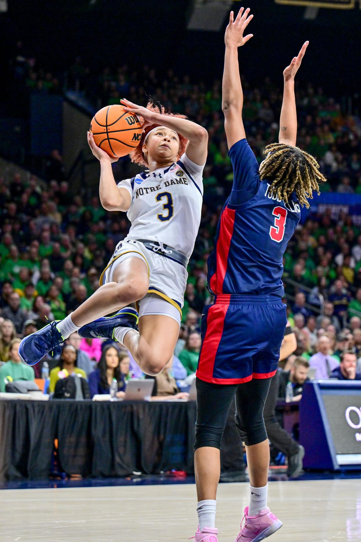 Notre Dame Fighting Irish guard Hannah Hidalgo (3) goes up for a shot as Ole Miss Rebels guard Kennedy Todd-Williams (3) defends in the second half of the NCAA Tournament second round game at the Purcell Pavilion March 25 in South Bend, Indiana.