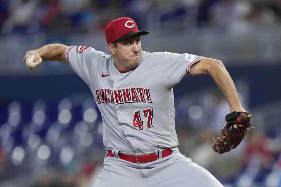 Cincinnati Reds' Derek Law delivers a pitch during the first inning of a baseball game against the Miami Marlins, Saturday, May 13, 2023, in Miami. (AP Photo/Wilfredo Lee)