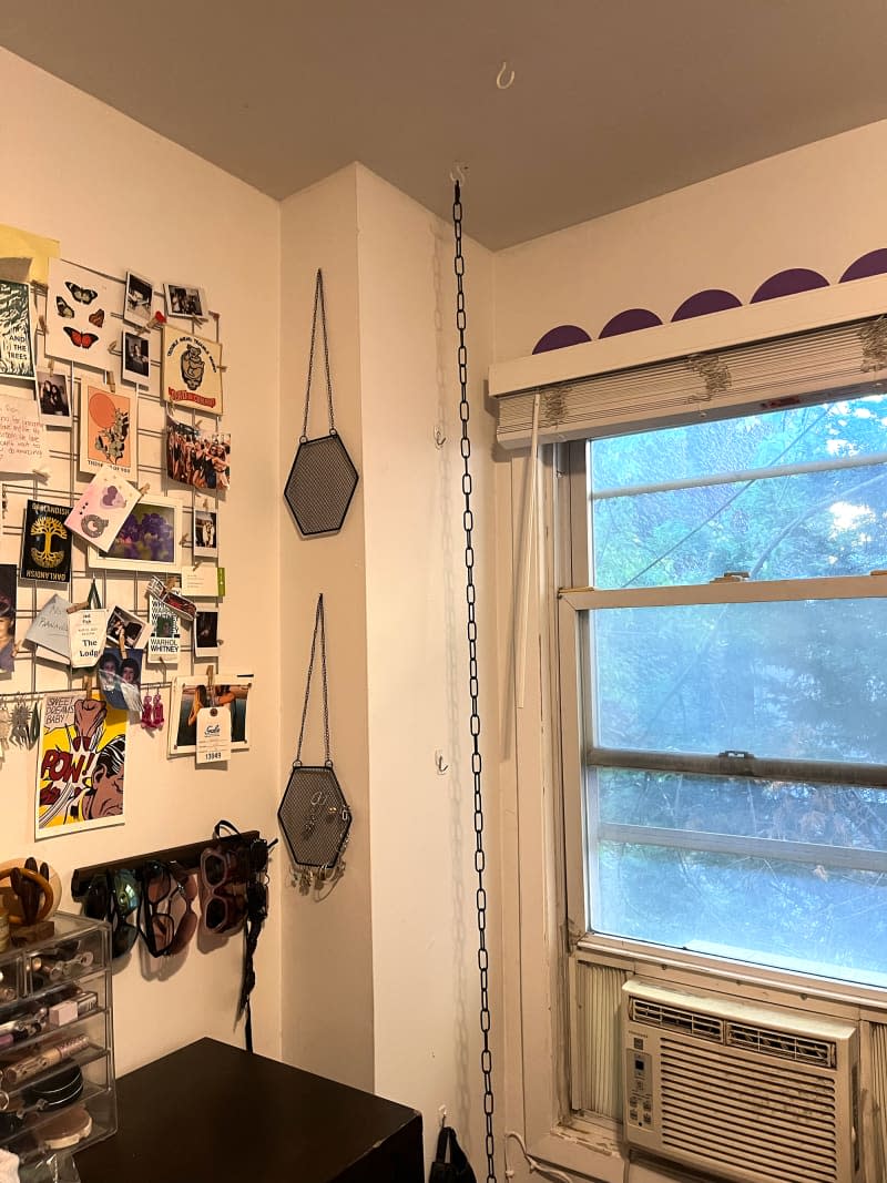 Chain hanging in bedroom.