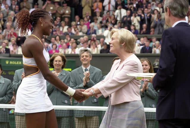 <p>Rebecca Naden - PA Images/PA Images via Getty</p> Katharine, the Duchess of Kent, presents Venus William with the Ladies Singles trophy at Wimbledon in 2000.