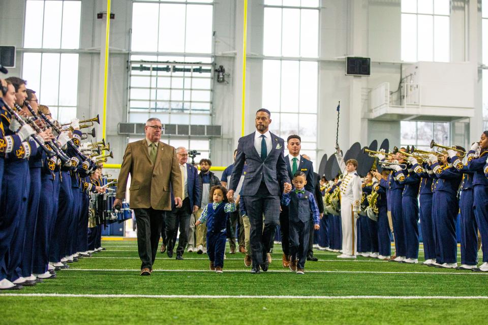 Notre Dame head football coach Marcus Freeman walks in for a press conference Monday, Dec. 6, 2021 at the Irish Athletic Center in South bend. 