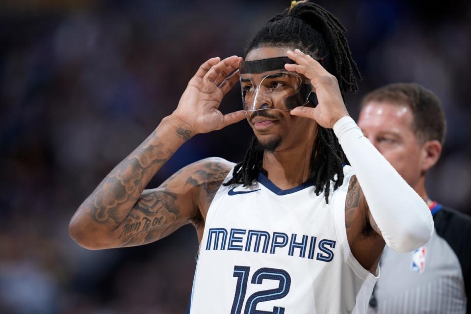 The NBA are investigating an incident in which Ja Morant appeared to brandish a gun at a night club (AP)