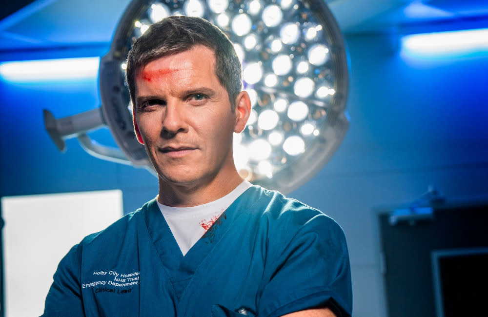 Casualty is to air a football grooming storyline, but Nigel Harman's character will step in to help credit:Bang Showbiz