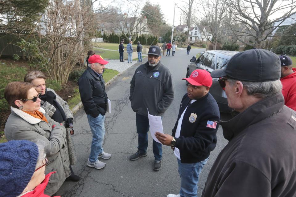 Mt. Vernon Public Works Commissioner Damini Bush talks to a group of Bronxville and Mt. Vernon residents in Bronxville March 1, 2024. They are concerned that a flood control project will cause flooding in their neighborhoods.