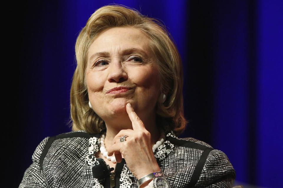 Former U.S. Secretary of State Hillary Clinton reacts to a question as she discusses her new book "Hard Choices: A Memoir" at George Washington University in Washington June 13, 2014. REUTERS/Jonathan Ernst (UNITED STATES - Tags: POLITICS SOCIETY)