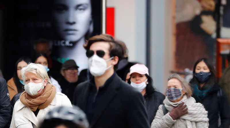 People wearing face masks are pictured at Schloss Strasse shopping street as the coronavirus disease (COVID-19) outbreak continues in Berlin