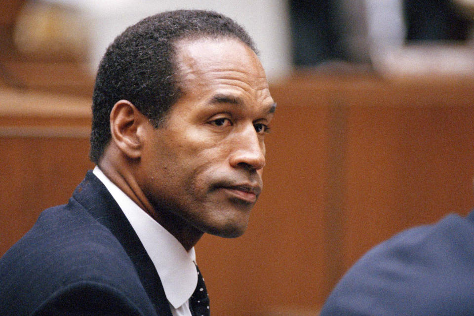 FILE - O.J. Simpson sits at his arraignment in Superior Court in Los Angeles on July 22, 1994, where he pleaded "absolutely, 100 percent not guilty" on murder charges. Simpson, the decorated football superstar and Hollywood actor who was acquitted of charges he killed his former wife and her friend but later found liable in a separate civil trial, died Wednesday, April 11, 2024, of prostate cancer. He was 76. (AP Photo/Pool/Lois Bernstein, Pool)