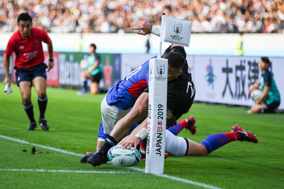 New Zealand's scrum-half TJ Perenara (C) scores a try during the Japan 2019 Rugby World Cup Pool B match between New Zealand and Namibia at the Tokyo Stadium in Tokyo on October 6, 2019. (Photo by CHARLY TRIBALLEAU / AFP) (Photo by CHARLY TRIBALLEAU/AFP via Getty Images)